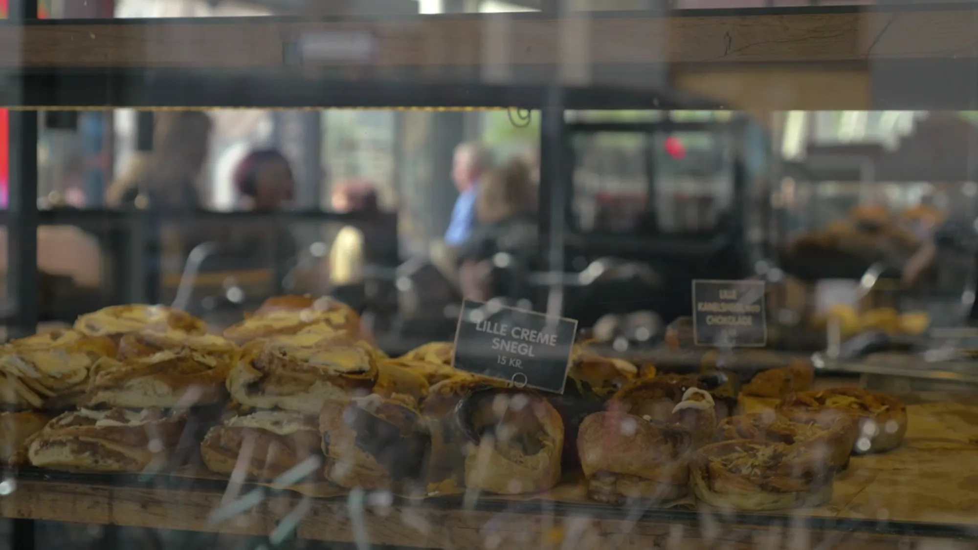Pastries lined up in the bakery display case