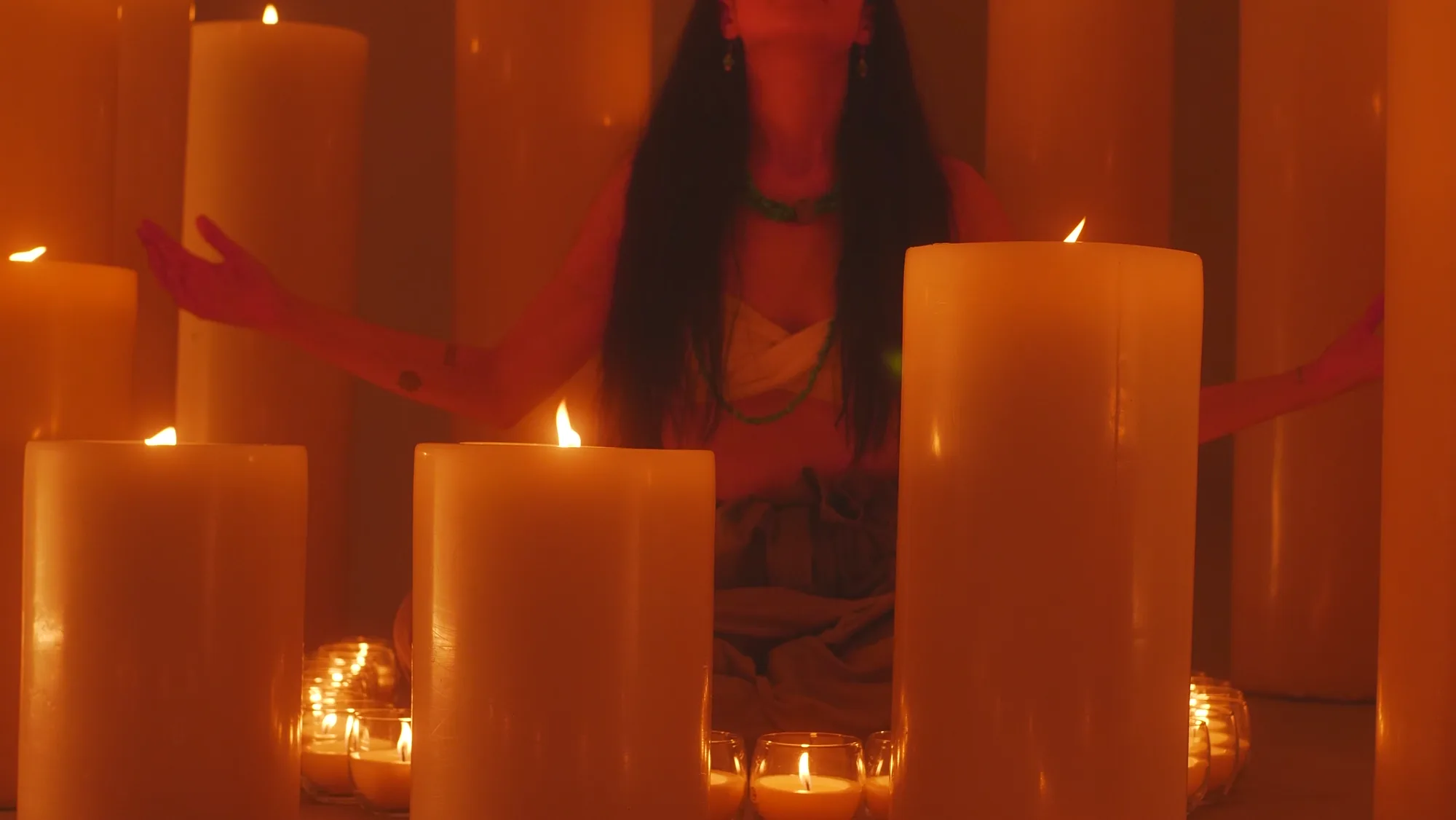 Rows of candles in a quiet room